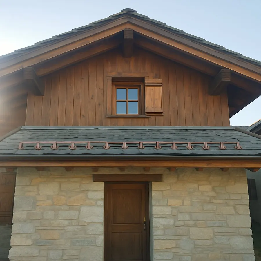 Chalet en pierre et mélèze avec une toiture refaite et une rive neuve